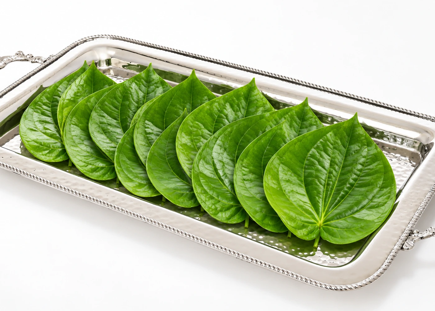 Fresh betel leaves and paan ingredients prepared for custom paan